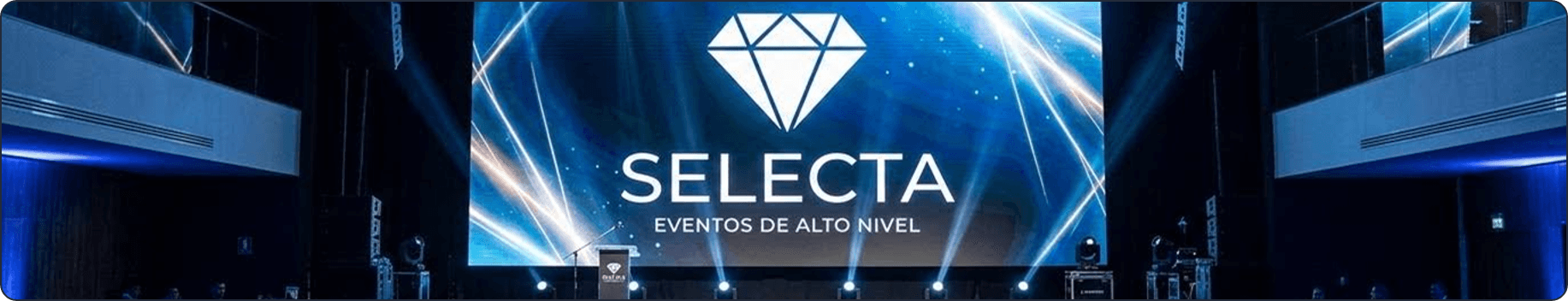 Escenario de un evento corporativo de Selecta con pantalla LED